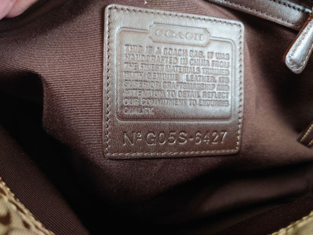 COACHコーチボストンバッグ　こげ茶色シグネチャー