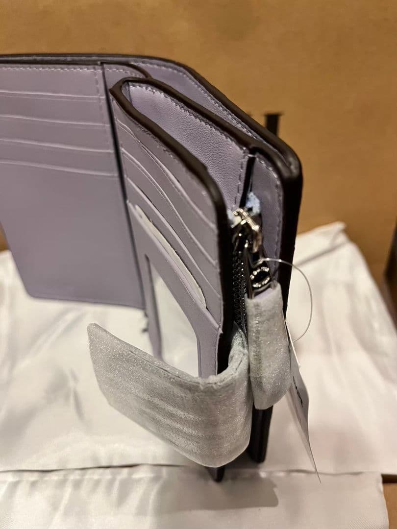 COACH ラベンダー 二つ折り財布 ACCORD VAR LTH 22753