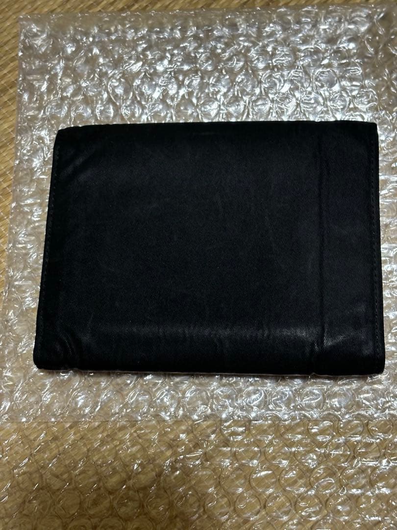 今だけ値下げ。美品。PRADA ブラック 三つ折り財布男女兼用。