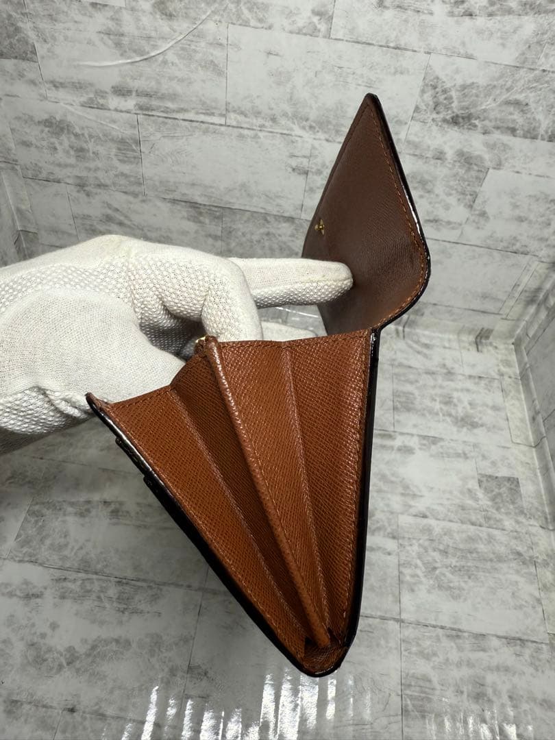 ルイ・ヴィトン 二つ折りフラップ長財布 モノグラム　中古