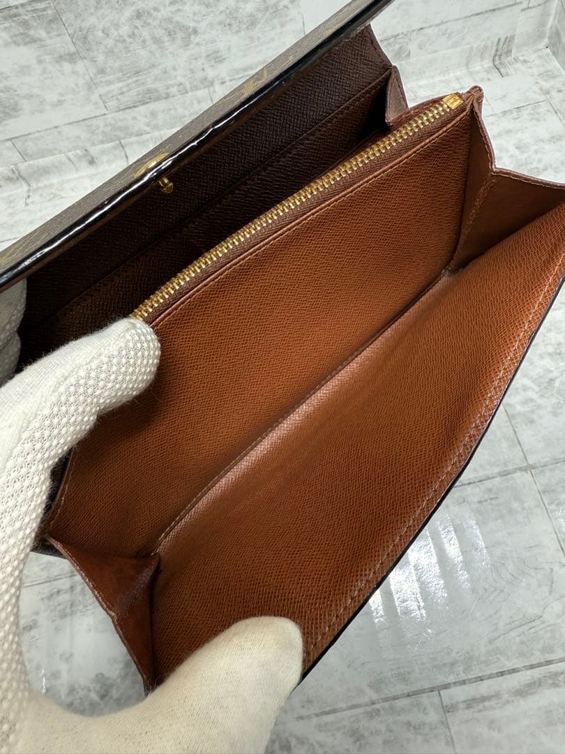 ルイ・ヴィトン 二つ折りフラップ長財布 モノグラム　中古