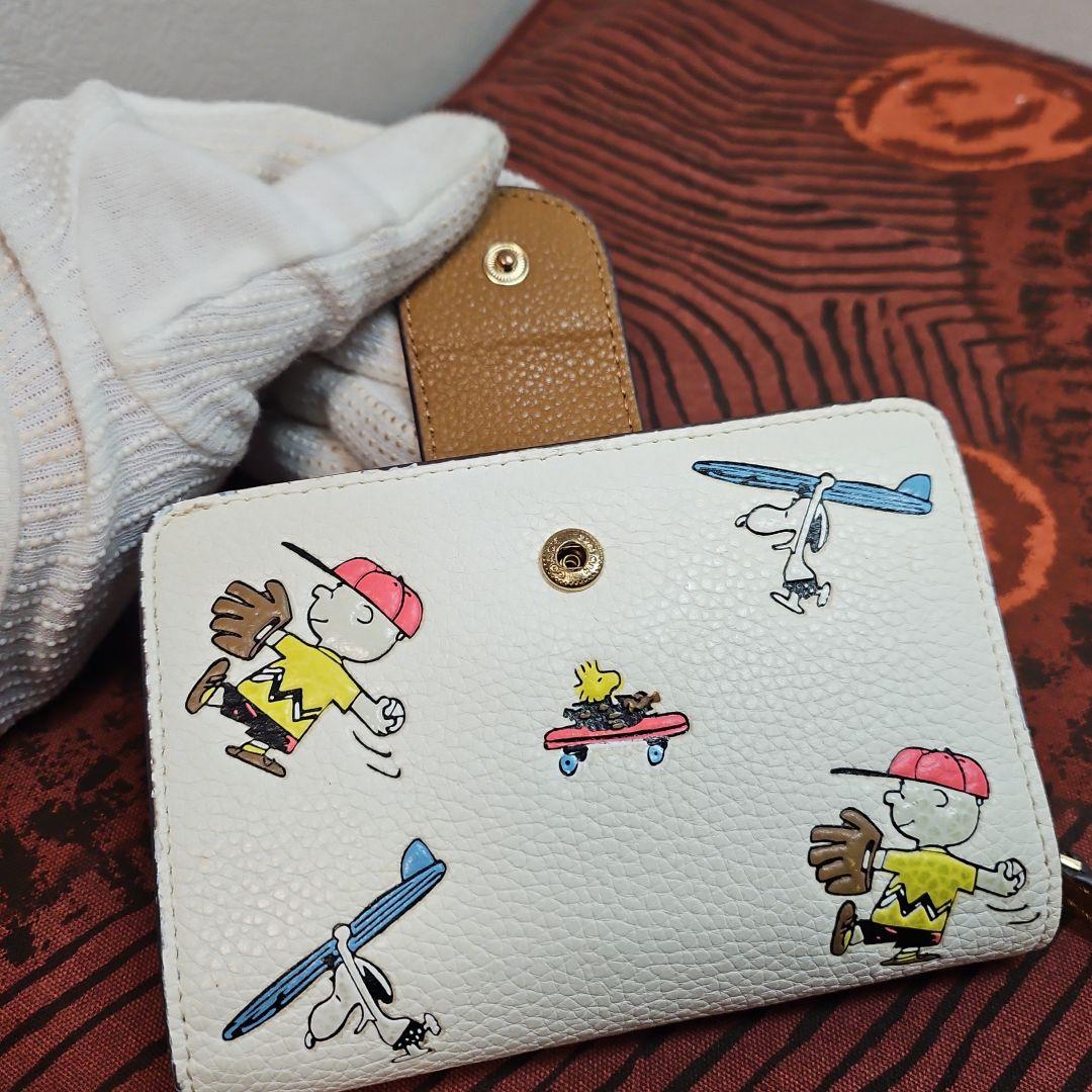 COACH コーチ 二つ折り 短財布 スヌーピー PEANUTS C4899