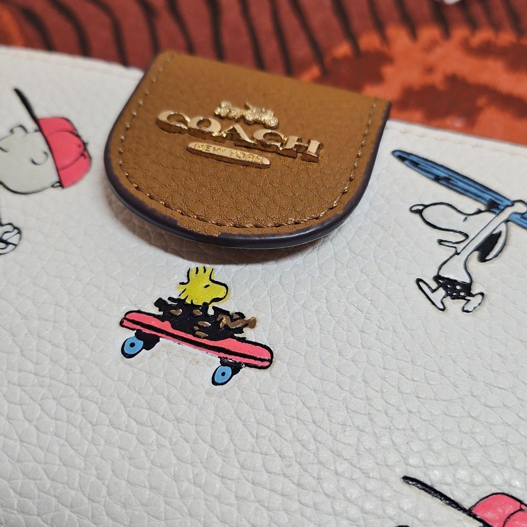 COACH コーチ 二つ折り 短財布 スヌーピー PEANUTS C4899