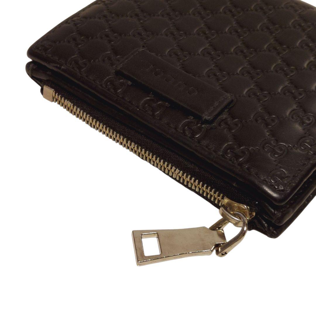 【GUCCI】2つ折り財布 黒 マイクロ レザー 型押し