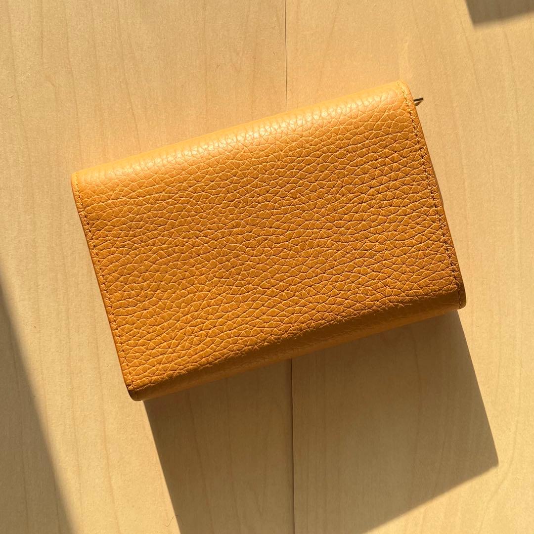 LOUIS VUITTONのポルトフォイユ・カプシーヌコンパクト財布