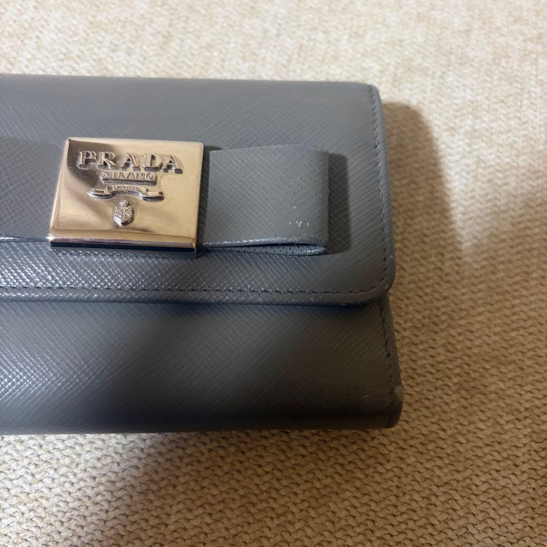 外箱/保証書付き PRADA ミニ財布 サフィアーノレザー リボン