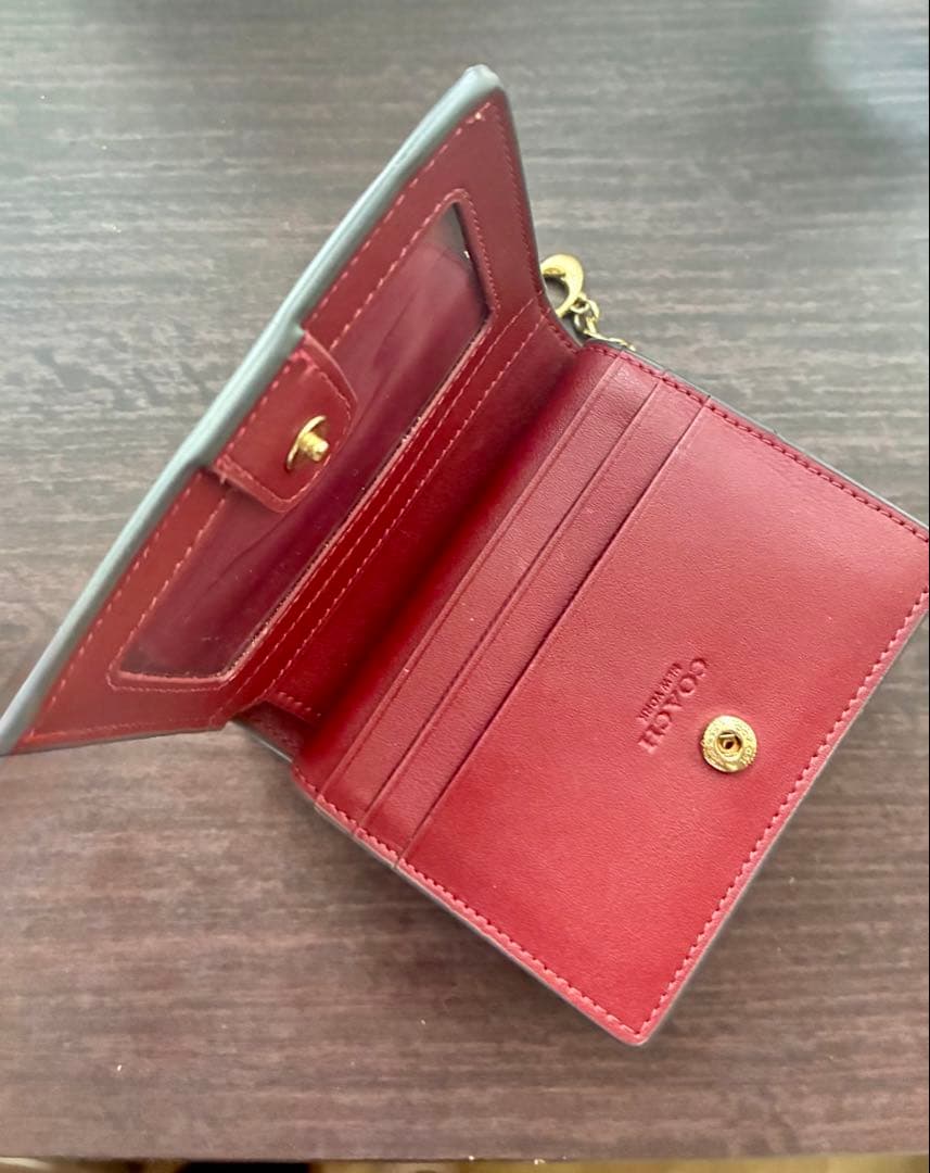 ヤ*カ様 COACH 猫プリント 二つ折り財布
