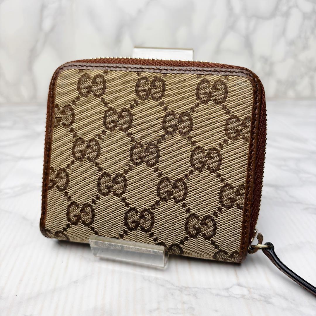 011 極美品 GUCCI 二つ折り財布 ラウンドファスナー GG柄 茶 m6