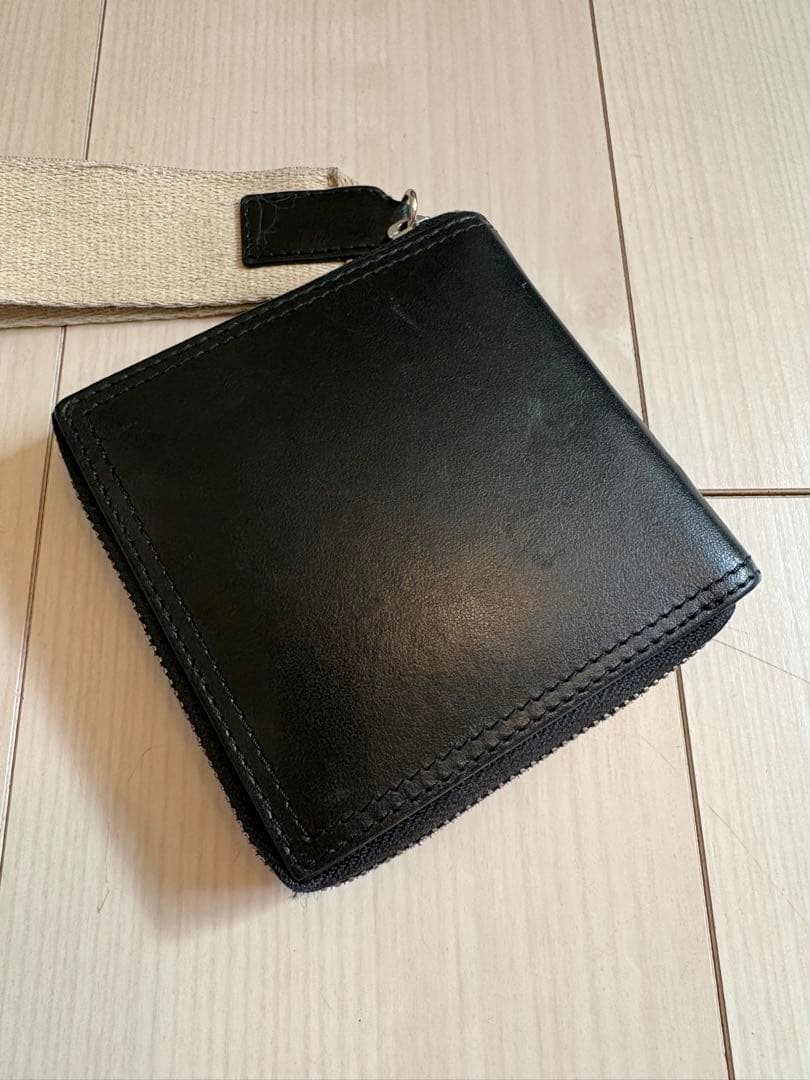 JACQUEMUS ブラックレザー二つ折り財布