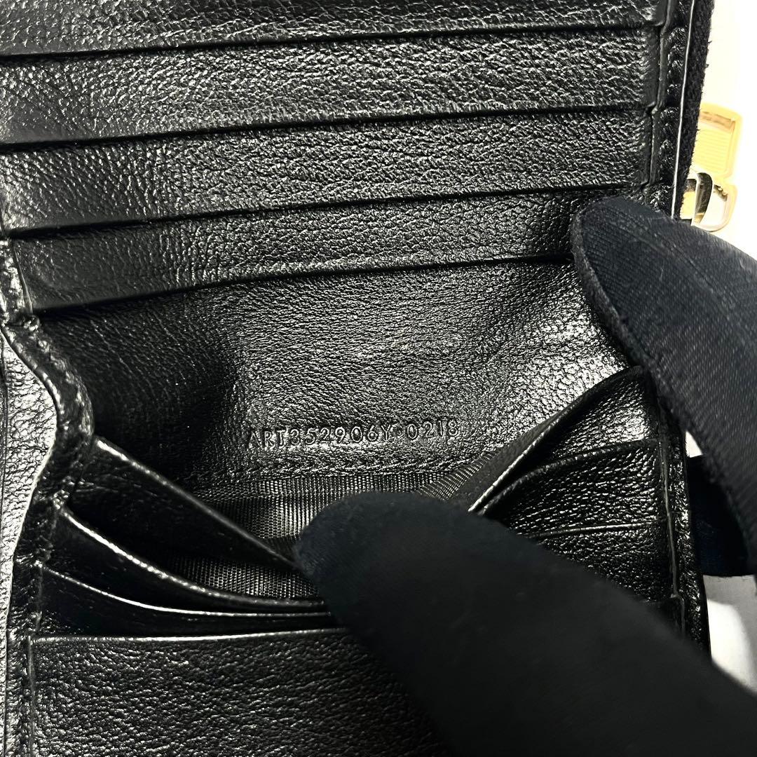 希少✨サンローラン 二つ折り財布 YSL エンボス レザー ファスナー 黒