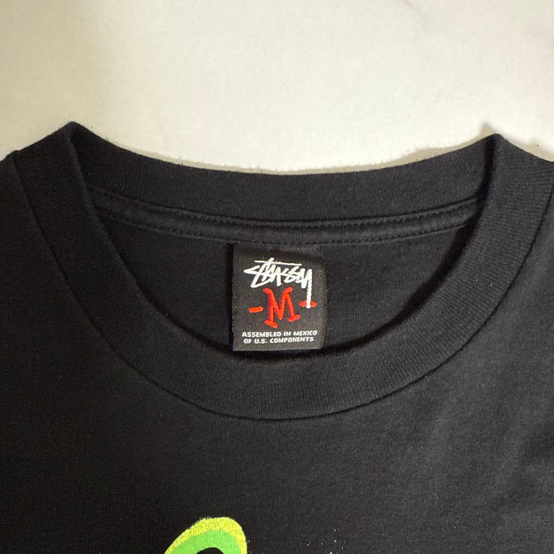 ロー様STUSSY ステューシー グラフィックTシャツ M 黒ネオングリーン